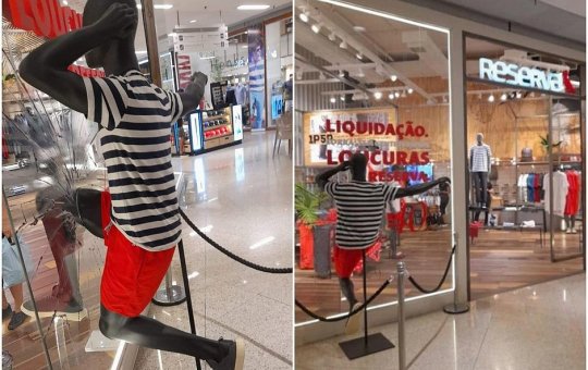 Loja causa polêmica após colocar manequim preto quebrando vidraça