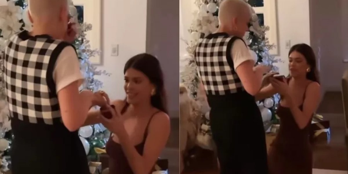 Em amigo secreto, Vitória Strada surpreende namorada com pedido de casamento