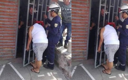 Mulher fica com cabeça presa em portão após tentar 'espiar' vizinha