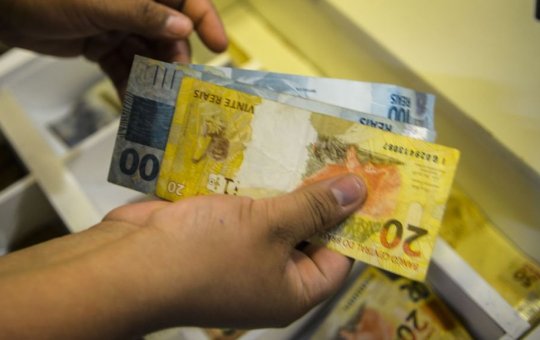 Caixa paga novo Bolsa Família a beneficiários com NIS de final 2