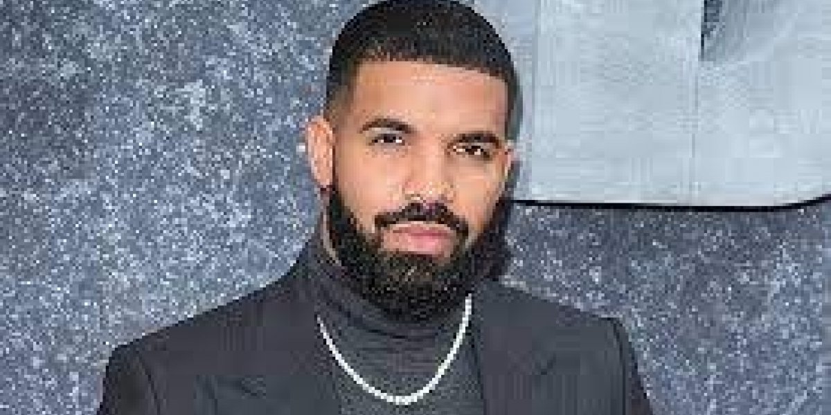 Drake empurra fã e critica segurança em show