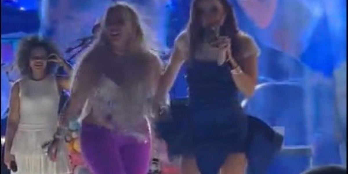 Ex-peoa Kally Fonseca é expulsa por Cláudia Leitte após invadir o palco