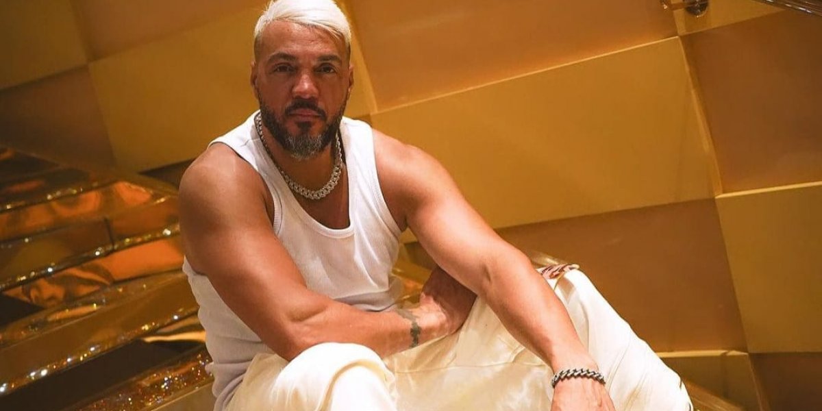 Belo é diagnosticado com Covid-19 e cancela participação no Baile da Santinha