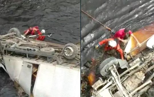 Motorista morre após carreta tombar e cair em rio às margens da rodovia