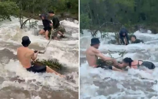 Turistas enfrentam cabeça d'água na Chapada dos Veadeiros e se seguram em pedras para não serem arrastados