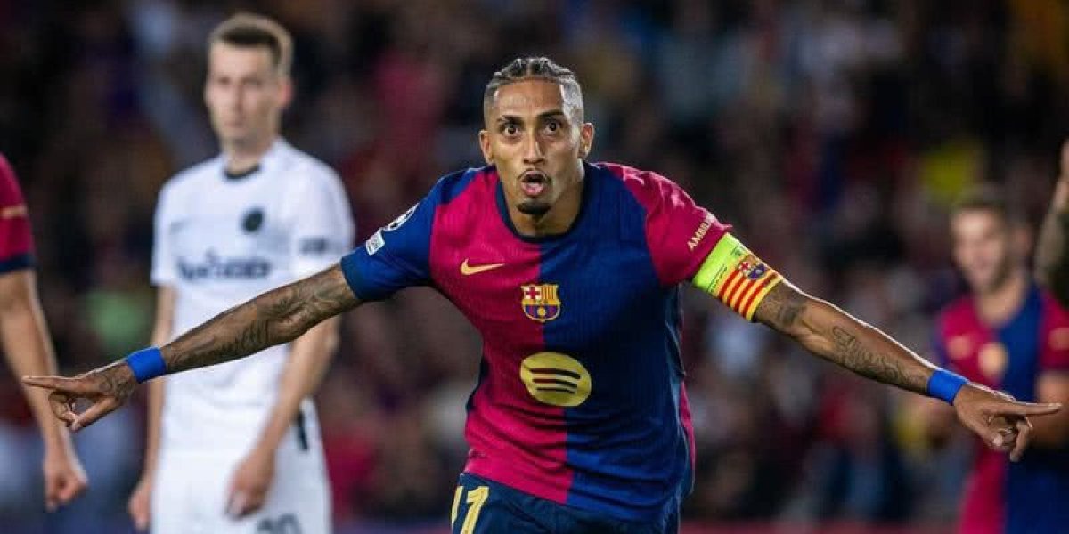 Raphina comemorando seu gol pelo Barcelona