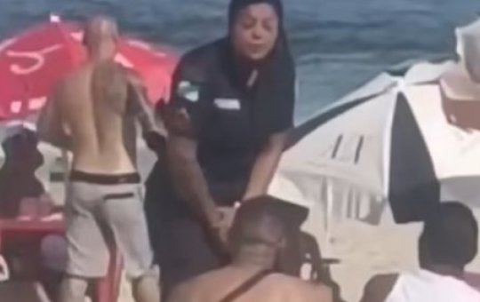 PM fardada briga com o marido em praia do Rio de Janeiro