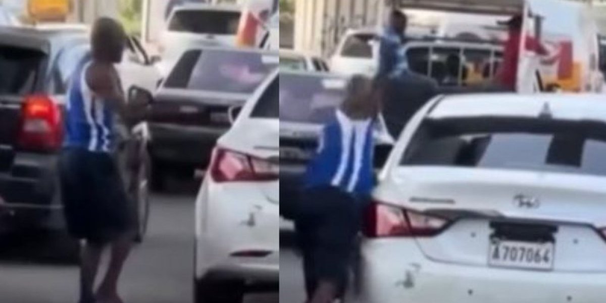 Momento em que o homem se levanta para atacar o carro