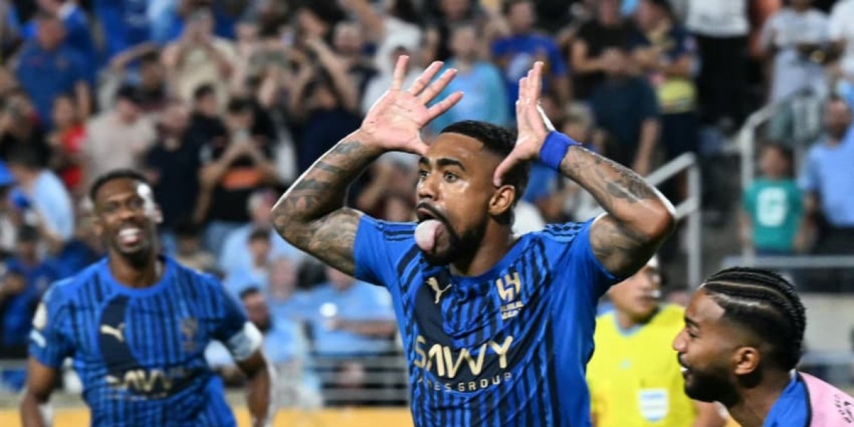Malcom comemorando seu gol