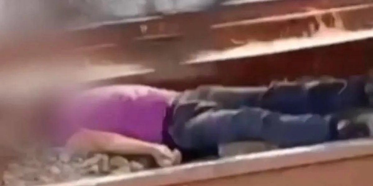 Vídeo mostra homem deitado em trilhos enquanto trem passa por cima em SP
