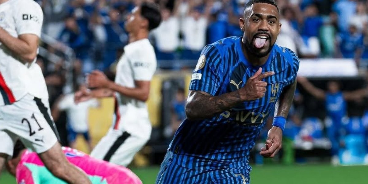Malcom comemorando gol