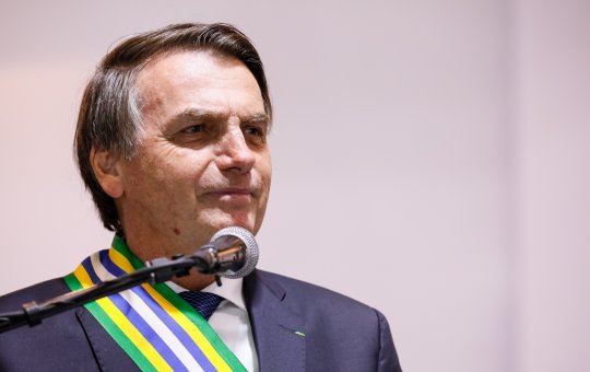 Jair Bolsonaro sorrindo