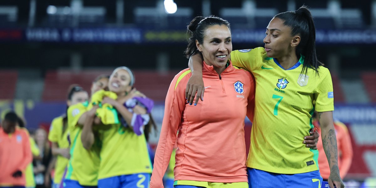 Jogadoras comemorando classificação