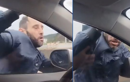  Homem tenta assaltar carro, mas fica pendurado na janela do veículo em movimento