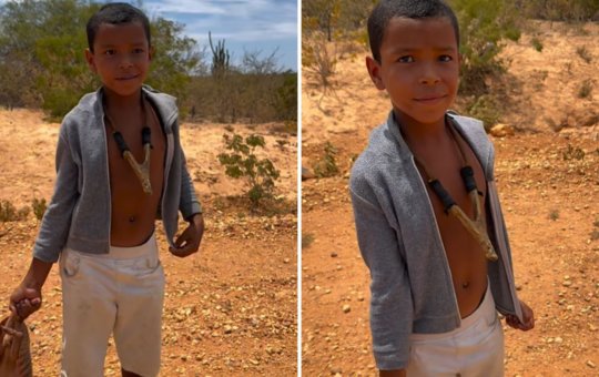 Menino com tatu na mão é surpreendido com R$ 300 para liberar animal e se alimentar