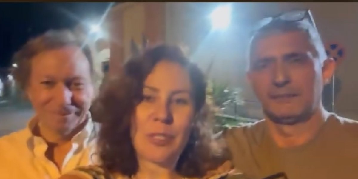 Carla Zambelli ao lado de advogado e marido
