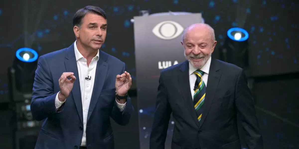 Flávio Bolsonaro provoca Lula em debate e diz: “Quem te prendeu está aqui”