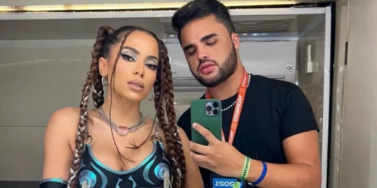 Annita toma banho de cerveja e dá beijo triplo no Carnatal